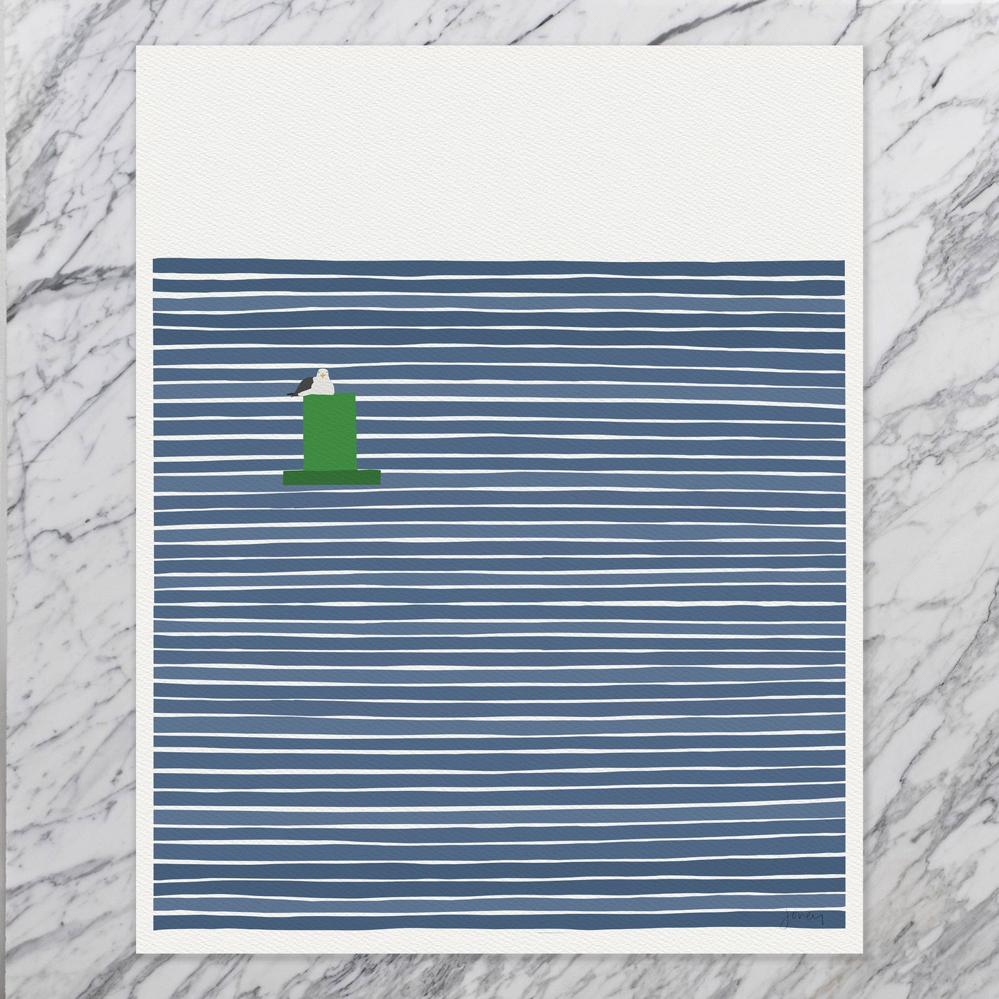 an unframed art print sitting on a marble tabletop. the print depicts a seagull sitting on a green channel marker buoy against a background of navy blue striped water. it is signed by artist Jorey Hurley and is on thick luxe paper.